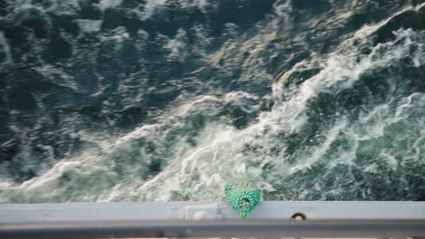 A-top-down-shot-of-a-water-wake-from-a-cruise-ship