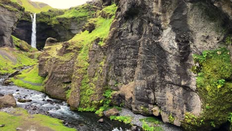 Kvernufoss-waterfall-flowing-of-the-cliff-in-Iceland-in-summer