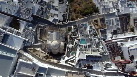 Top-View-over-Touristic-Fira-Traditional-Settlement-Houses,-Santorini,-Greece