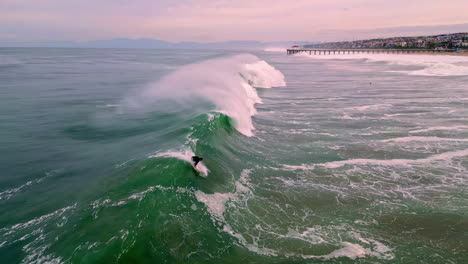 Man-catching-a-wave-and-immediately-bailing-from-the-turbulence