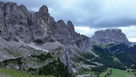Breathtaking-panoramic-view-of-Dolomites-mountain-range-on-cloudy-day-in-summer-season,-Italy