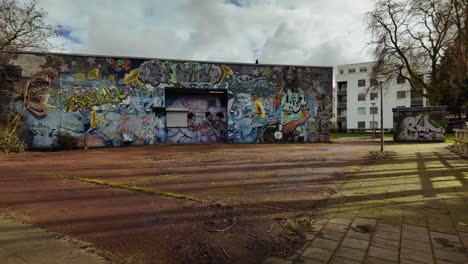 Graffiti-and-street-art-at-IJplein-residential-area-at-Meeuwenlaan-in-Amsterdam-Noord