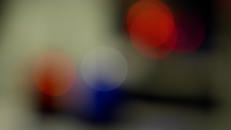 Defocused-Police-Red-Blue-Emergency-Lights-Flashing-In-The-Dark