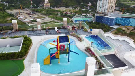 Rooftop-pool-bar-and-kids-play-area-in-touristic-family-friendly-hotel