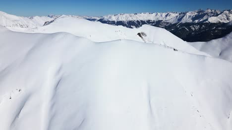 beautiful-view-over-snow-covered-mountains-and-a-blue-sky