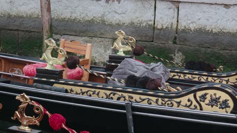 Ornate-Gondolas-Moored-in-Venice,-Italy---close-up-detail