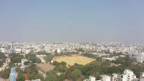 Rajkot-kite-festival-aerial-drone-view-drone-camera-moving-forward-where-different-types-of-big-kites-are-flying