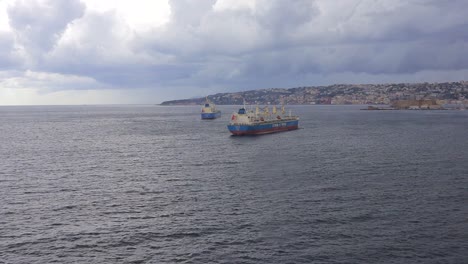 Commercial-international-shipping-vessels-anchor-in-the-Bay-of-Naples