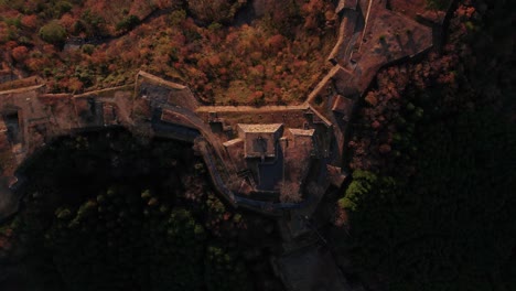 Top-Aerial-Drone-View-of-Ancient-Castle-Ruins-in-Takeda-Japanese-Mountain-Valley
