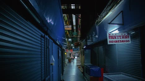 Quiet-Alleyway-in-Bangkok-at-Night-with-Closed-Market-Stalls