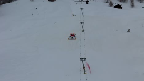 Stunning-Livigno-Alps-drone-video:-snow-peaks,-city-and-mountain-town,-ideal-for-high-quality-winter-and-tourism-ads