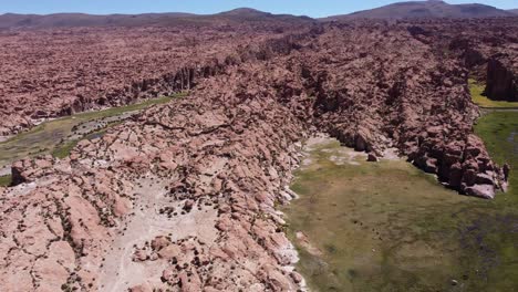 Aerial-orbits-unique-rugged-rock-landscape-of-Valle-de-las-Rocas