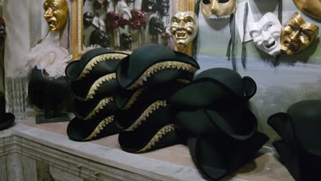 Elegant-tricorn-hats-with-gold-trim,-Ca'-Macana-Venice