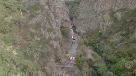 Aerial-dolly-shot-of-the-rock-valley-in-the-Casal-de-São-Simão---a-unique-landscape-in-the-mountains