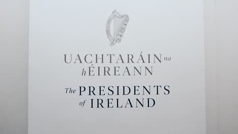 Wall-plaque-reading-"Uachtaráin-Éireann