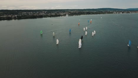 An-orbit-shot-of-a-sailboat-race-in-the-Alpine-foreland