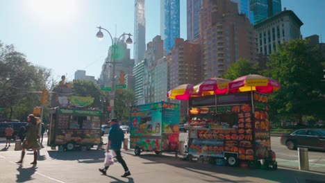 Street-food-vendors-outside-Central-Park-with-Manhattan-metropolis-towering-skyline