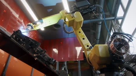 Metal-iron-laser-argon-welding-robot-in-factory