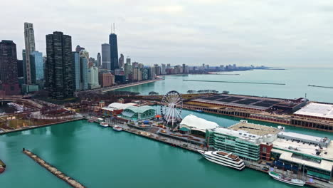 Drone-shot-around-the-Centennial-Wheel-at-Navy-Pier,-gloomy-winter-day-in-Chicago