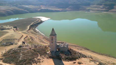Sau-swamp-dike-in-Catalonia,-Spain,-intense-drought-in-2024-Swamp-church