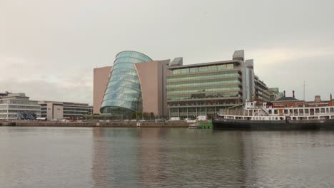 Convention-Centre-Dublin-And-Floating-Bar-And-Restaurant-On-River-Liffey,-Dublin-Docklands,-Ireland