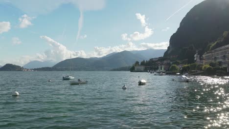 Fisherman-Cathes-Fish-in-Lake-Como-near-Town-of-Menaggio