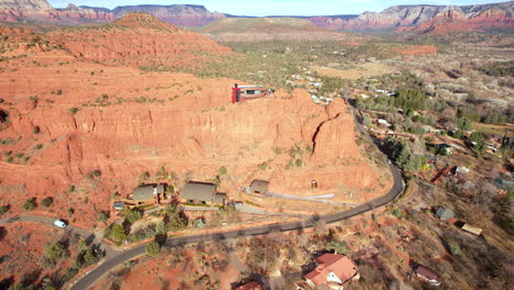 Drone-Shot-of-Modern-Futuristic-House-in-Sedona-Arizona,-Red-Rock-Point-Building-and-Landscape