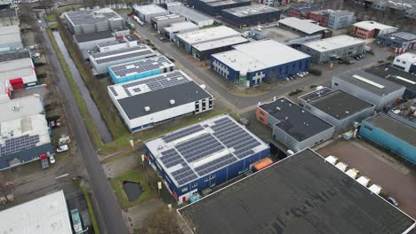 High-angle-view-of-industrial-building-with-rooftop-filled-with-solar-panels