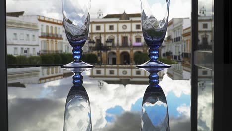 Crystal-glasses-Reflection-in-Medina-Sidonia,-Cádiz