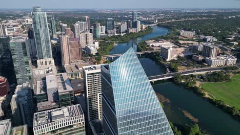 Circling-the-Sailboat-Building-to-reveal-Lady-bird-lake-and-the-Austin-skyline