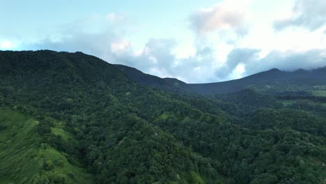 Green-Mountains-And-Rainforest-In-Guadeloupe,-France---Aerial-Drone-Shot