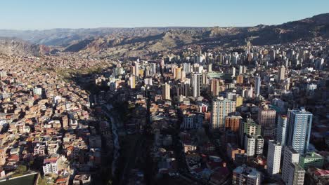 Rotating-aerial-flyover-of-La-Paz-Bolivia-high-mountain-city-skyline