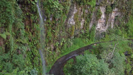 Waterfalls-on-overhanging-section-of-Yungas-'Death'-Road-in-Bolivia