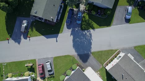 An-Aerial-Down-Looking-View-of-a-Well-Kept-Mobile,-Manufactured,-Prefab-Home-Park-of-Single-Wide-and-Double-Wide-Houses-on-a-Sunny-Day