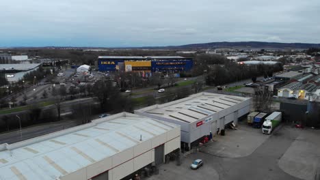 Rising-drone-shot-showing-the-Ikea-in-Milton-Keynes,-Buckinghamshire,-UK