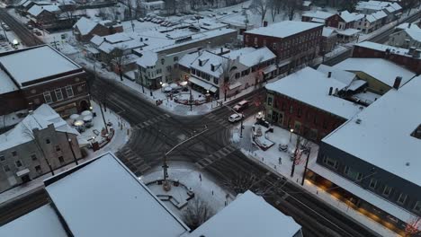 Small-town-square-covered-in-snow-at-night