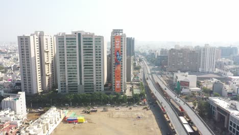 Rajkot-aerial-drone-view-A-big-Jai-Shri-Ram-banner-on-a-big-building-in-Rajkot-is-visible-on-silver-hight