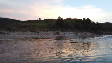 Stone-Valley-River-Landscape,-Colorful-Sunset-Skyline-in-Villa-Yacanto-Cordoba-Argentina,-Río-Grande,-Indigenous-Sierras-Land