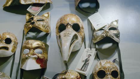 Gold-Plague-Doctor-Masks,-Ca'-Macana-Venice
