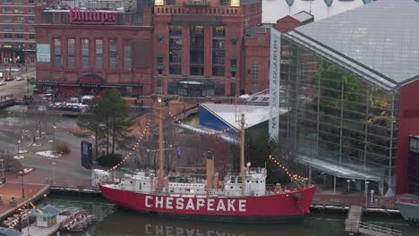 Aerial-Panning-Shot-of-Large-Tourist-Boat-in-Chesapeake-Bay,-Baltimore-Daytime