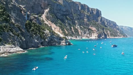 Cala-Goloritze-and-Boat-tourism-at-Orosei-Gulf,-Sardinia