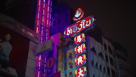 Glowing-chinese-signs-in-Chinatown,-Bangkok