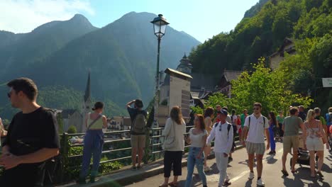 Crowds-of-People-Line-Up-to-Take-Pictures-of-Hallstatt-Village