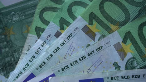 Los-Billetes-De-100-Euros-Giran-Como-Fondo