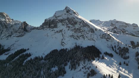 Fronalpstock-Glarus-Switzerland-sunny-cold-blue-sky-day-in-the-Alps-side-flight