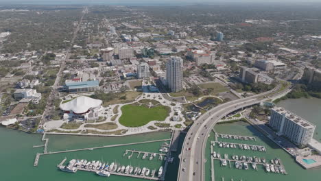 High-aerial-view-of-downtown-Clearwater,-Florida-panning-around-to-Intracoastal-water-view