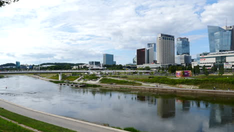 Vilnius-modern-Lithuanian-city-with-Europa-tower-and-skyscrapers-reflection-in-the-Neris-river