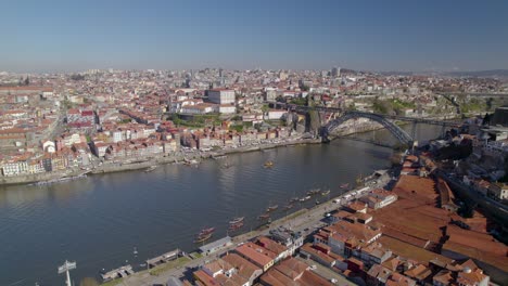 Aerial-orbit-with-a-stunning-panorama-of-the-Porto-Old-Town-with-Ponte-Dom-Luís-I-bridge-over-the-Douro-River