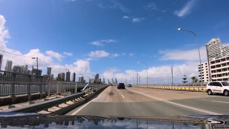 POV-driving-over-Sundale-Bridge-towards-Surfers-Paradise,-Gold-Coast