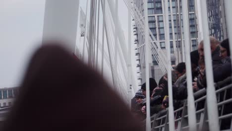 Palestinian-Flag-Flying-on-Embankment-Bridge-During-Ceasefire-Protest